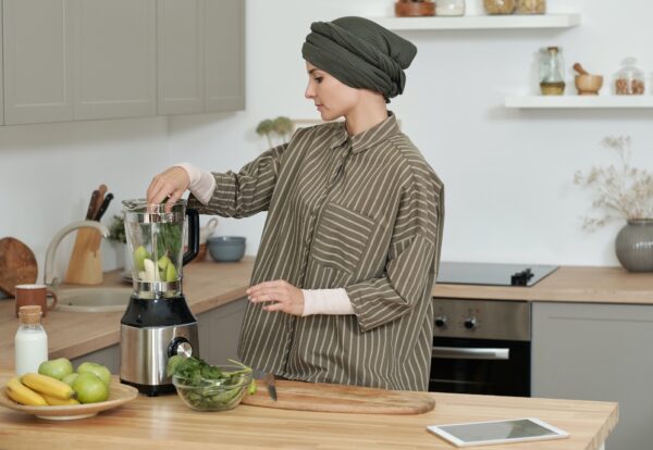 Muslim Woman In Kitchen